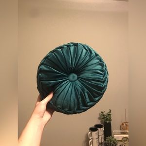 Tufted round accent pillow